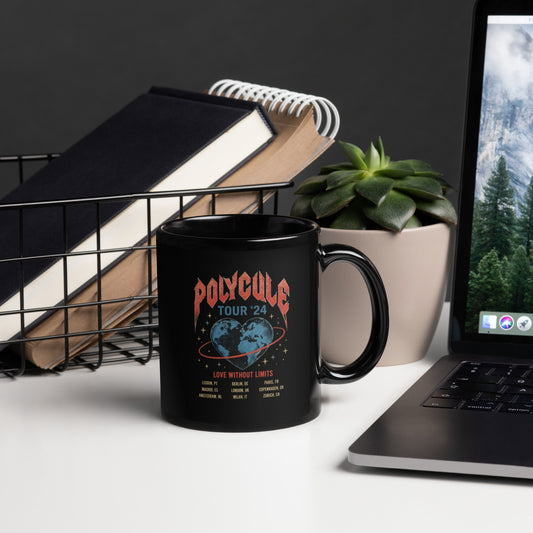 Black ceramic mug featuring vintage Polycule Tour concert graphic with heart globe illustration celebrating polyamory, ENM, metamours and love without limits.