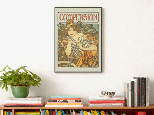 Framed vintage-style poster titled "Compersion" with an art nouveau illustration of a woman. Below, a wooden shelf holds books and a potted plant.