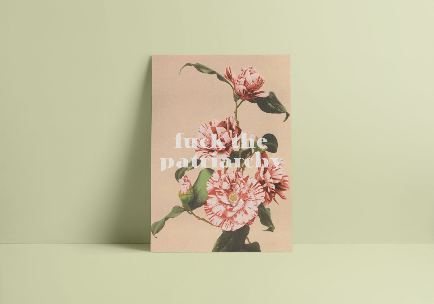 A minimalist decor with a vintage inspired feminist poster on a light colored wall features "Fck the patriarchy" in stylized letters.