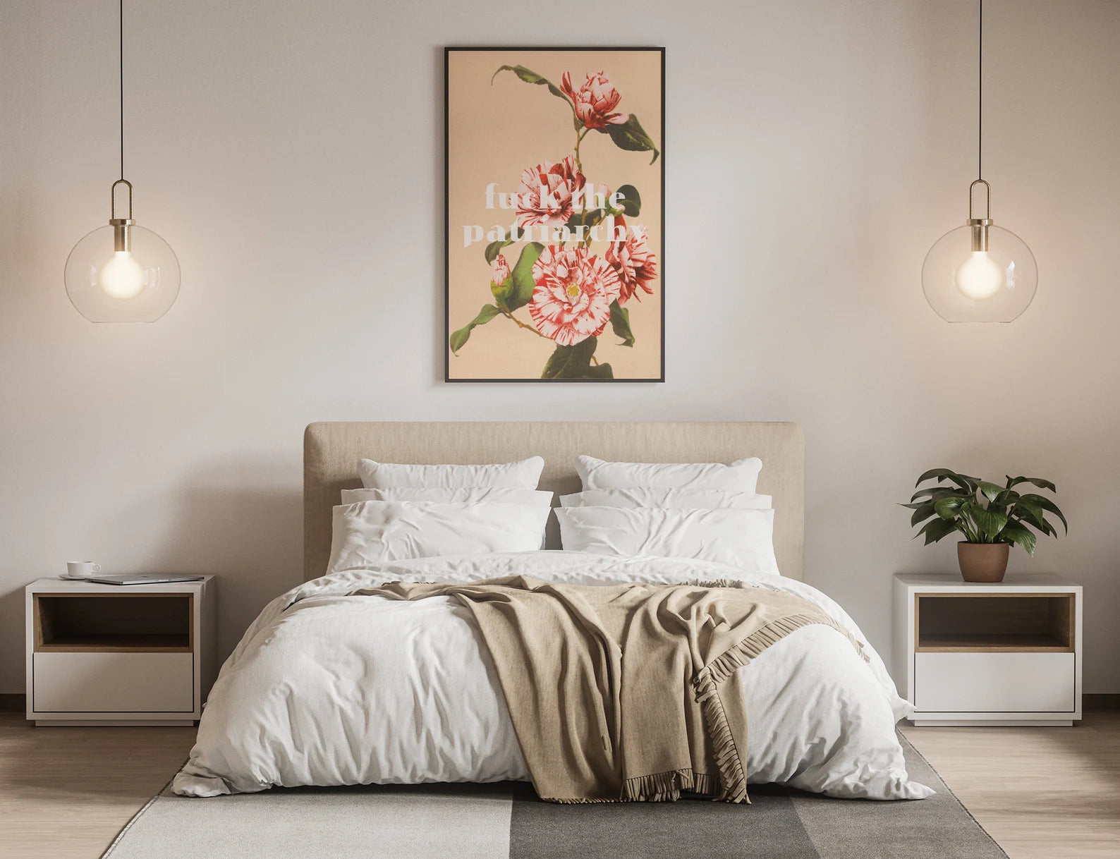 Cozy bedroom with a bed, white bedding, a throw, and a framed feminist print on the wall with flowers and a stylized font. Modern pendant lights and a plant on nightstands add warmth.