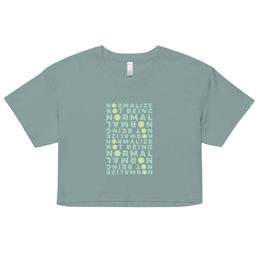Light green cotton crop top with neurodivergent affirmation and smiley design – soft tee for non-normative pride and empowerment”