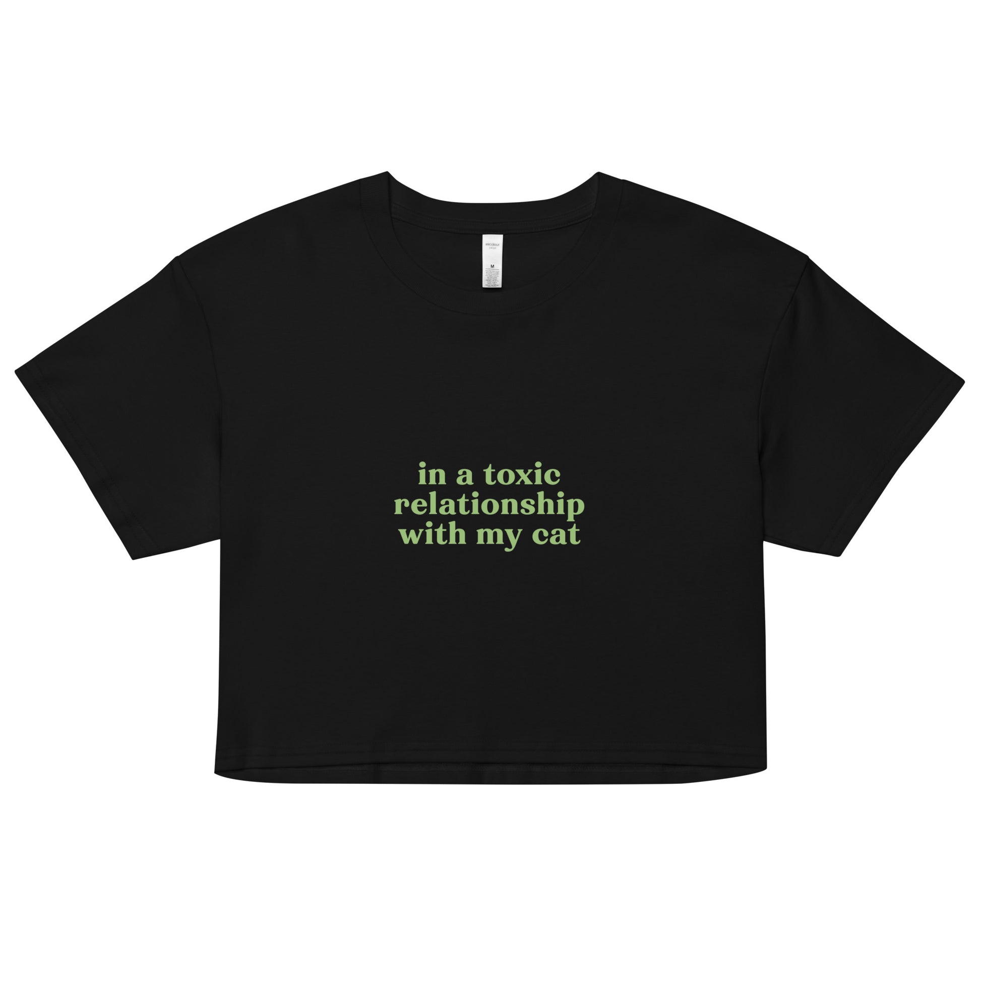 Black cotton crop top with green toxic cat relationship quote – soft sarcastic tee for jaded cat lovers and introverted humor wear