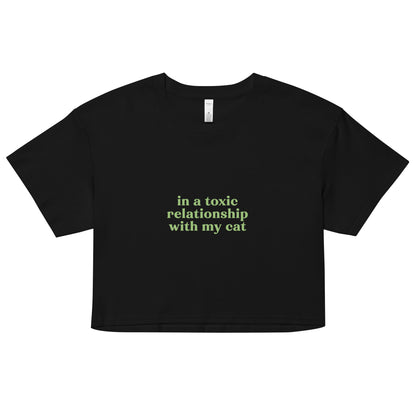 Black cotton crop top with green toxic cat relationship quote – soft sarcastic tee for jaded cat lovers and introverted humor wear