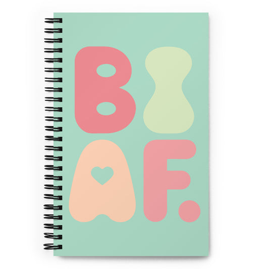 Spiral notebook with soft pastel green bisexual pride design – gentle retro-style LGBTQ+ journal for daily writing or queer visibility