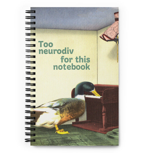 Vintage-style spiral notebook featuring a duck beside a desk with the text “Too Neurodiv for This Card” for neurodivergent journaling or doodling.