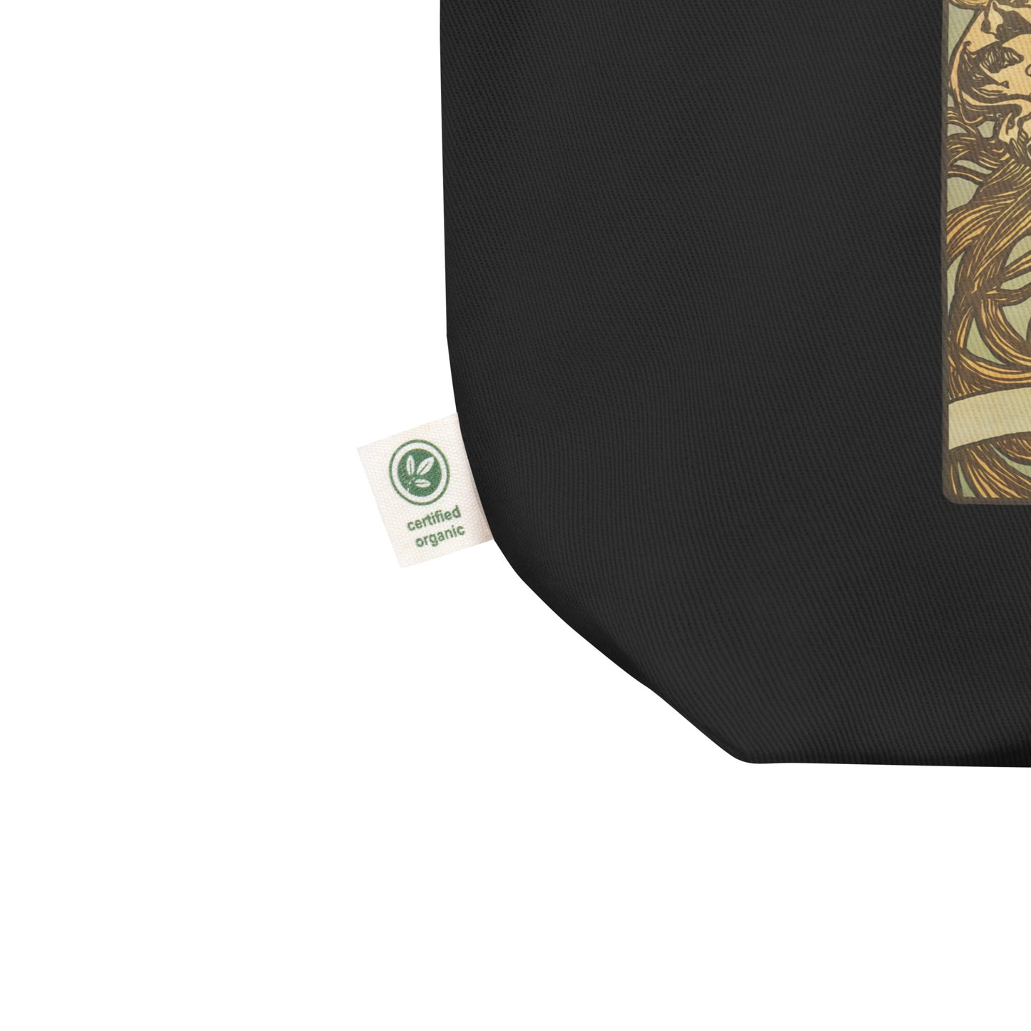 Close-up of vintage Compersion design on black tote bag with certified organic label
