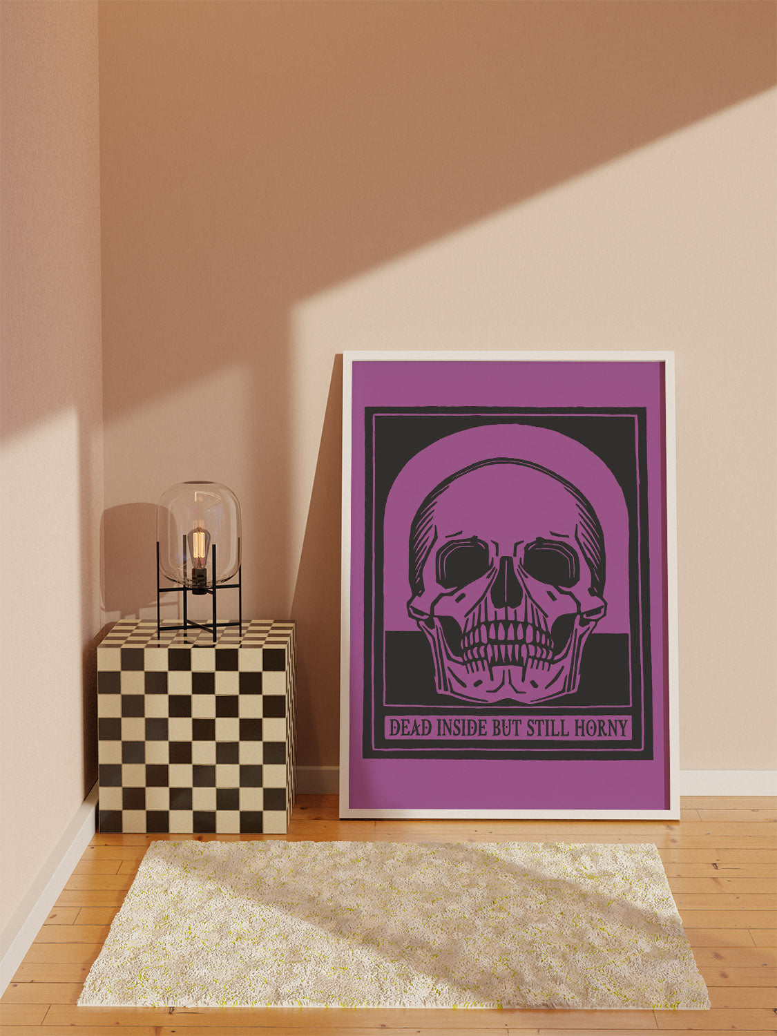 A minimalist room with soft sunlight. A framed funny printable art with sarcastic quote for bedroom decor is on the floor. A lamp sits on a checkered cube.