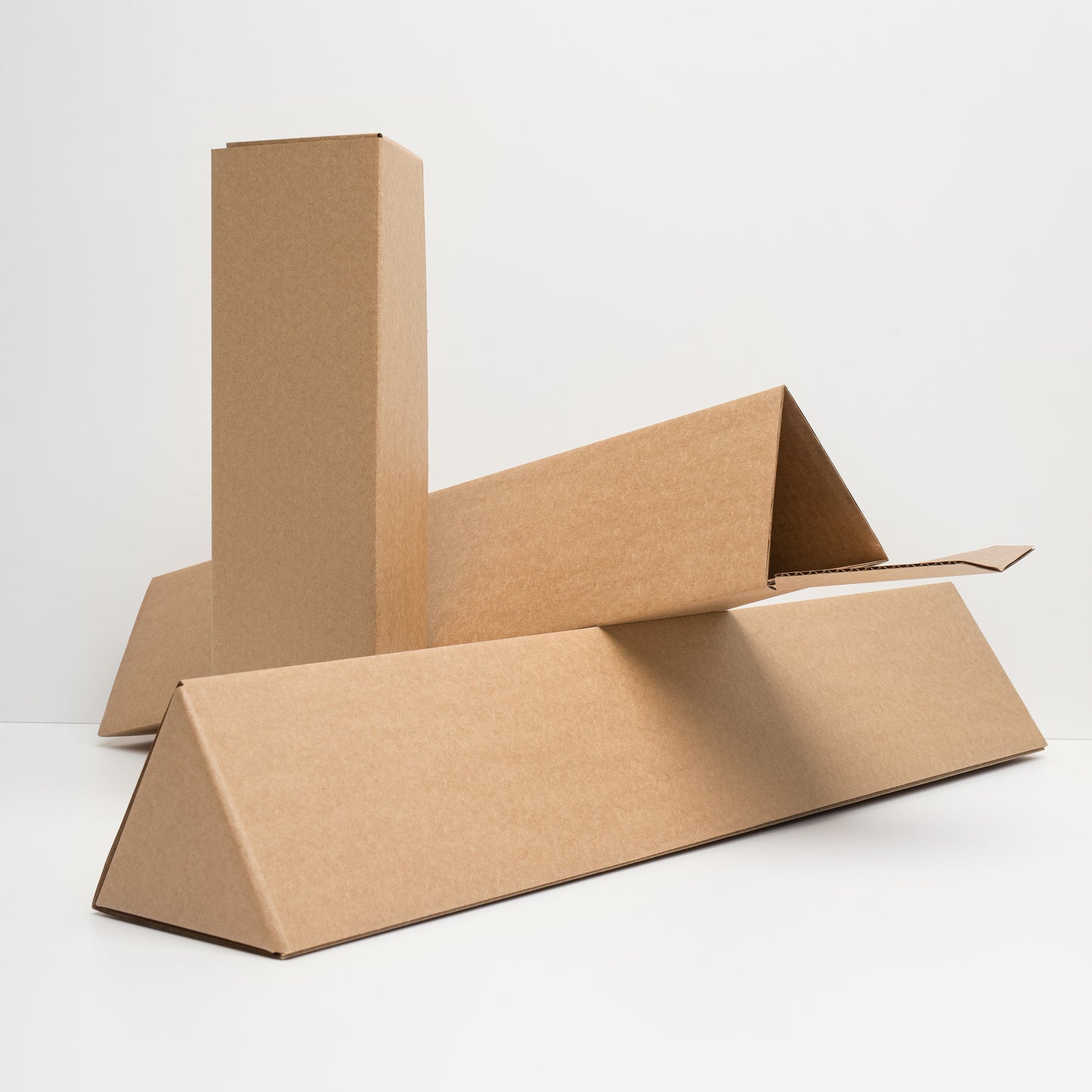 Cardboard boxes for shipping posters on a white background