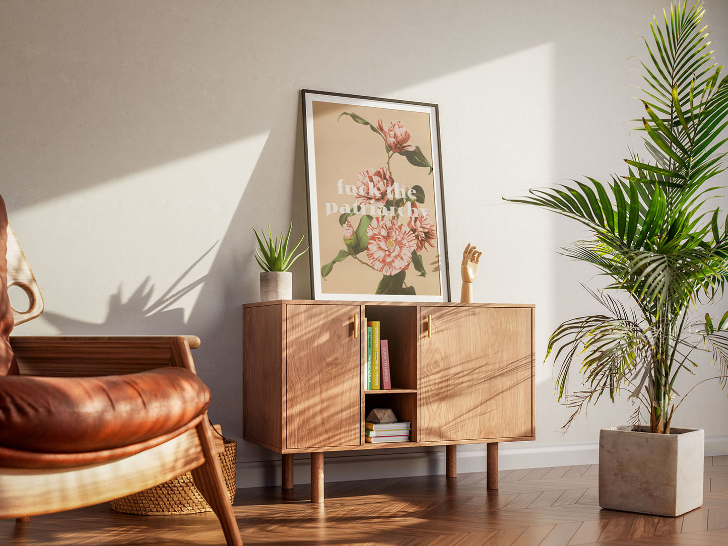 A cool living room with a framed vintage inspired feminist poster with soft colors and flowers. A wooden armchair, a cabinet and houseplants create a warm, inviting atmosphere.