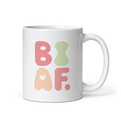 Pastel green ceramic bisexual pride mug with retro accents – subtle LGBTQ+ expression for home or office use