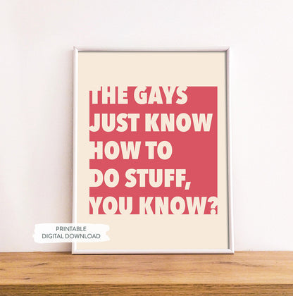 Printable poster with bold red background featuring 'The Gays Just Know How to Do Stuff' quote shown in white frame on wood shelf
