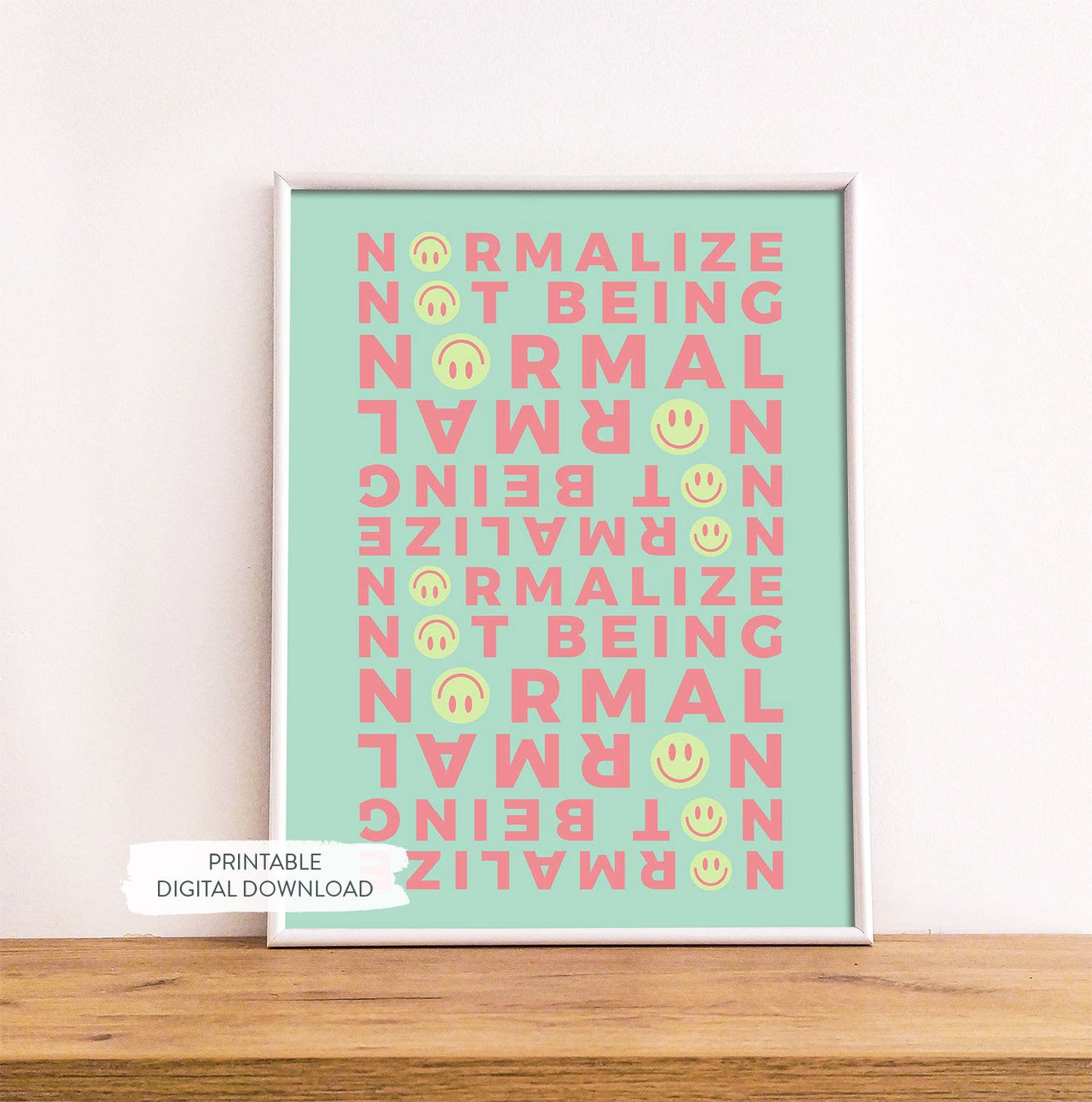 Neurodivergent Affirmation Poster with green background shown in white frame on wood shelf