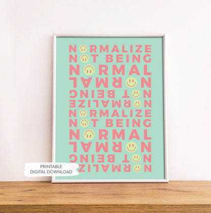 Neurodivergent Affirmation Poster with green background shown in white frame on wood shelf