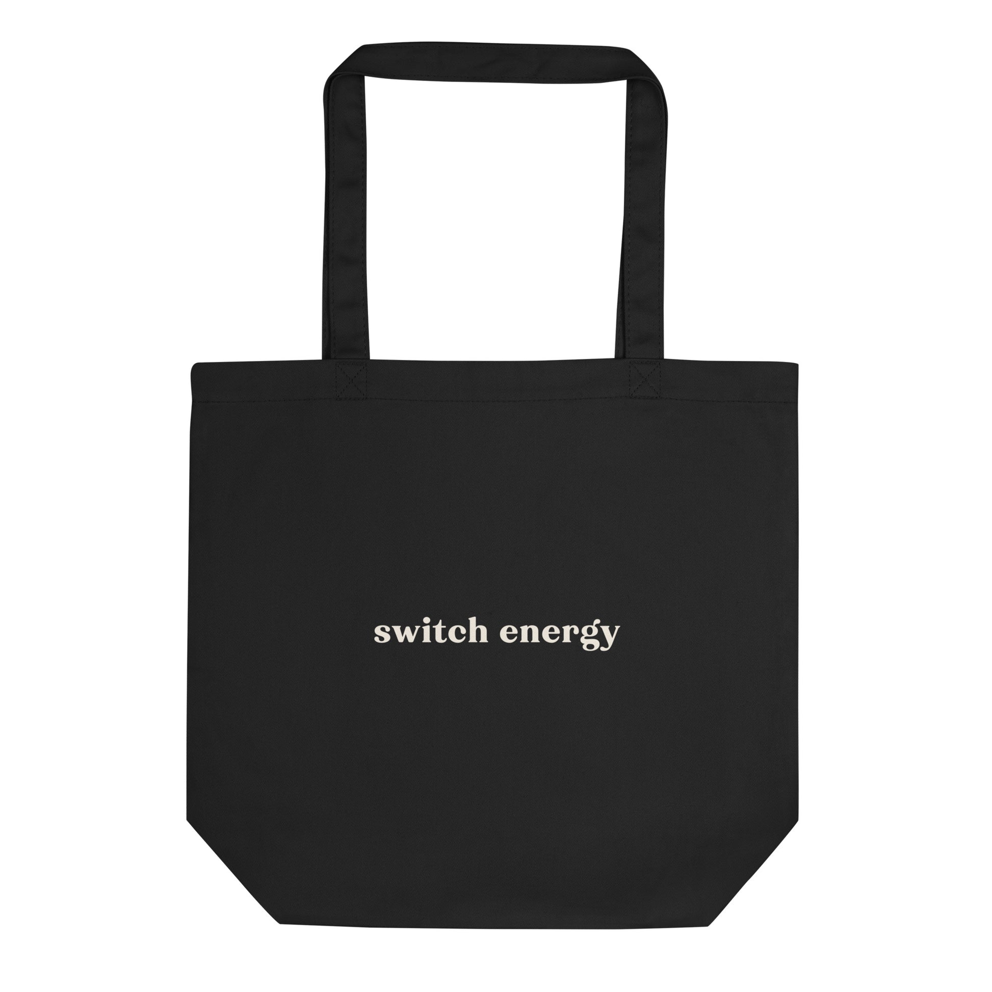 Black eco tote bag with cream “Switch Energy” text – play-friendly statement bag for pleasure-positive fashion and expressive, versatile everyday style