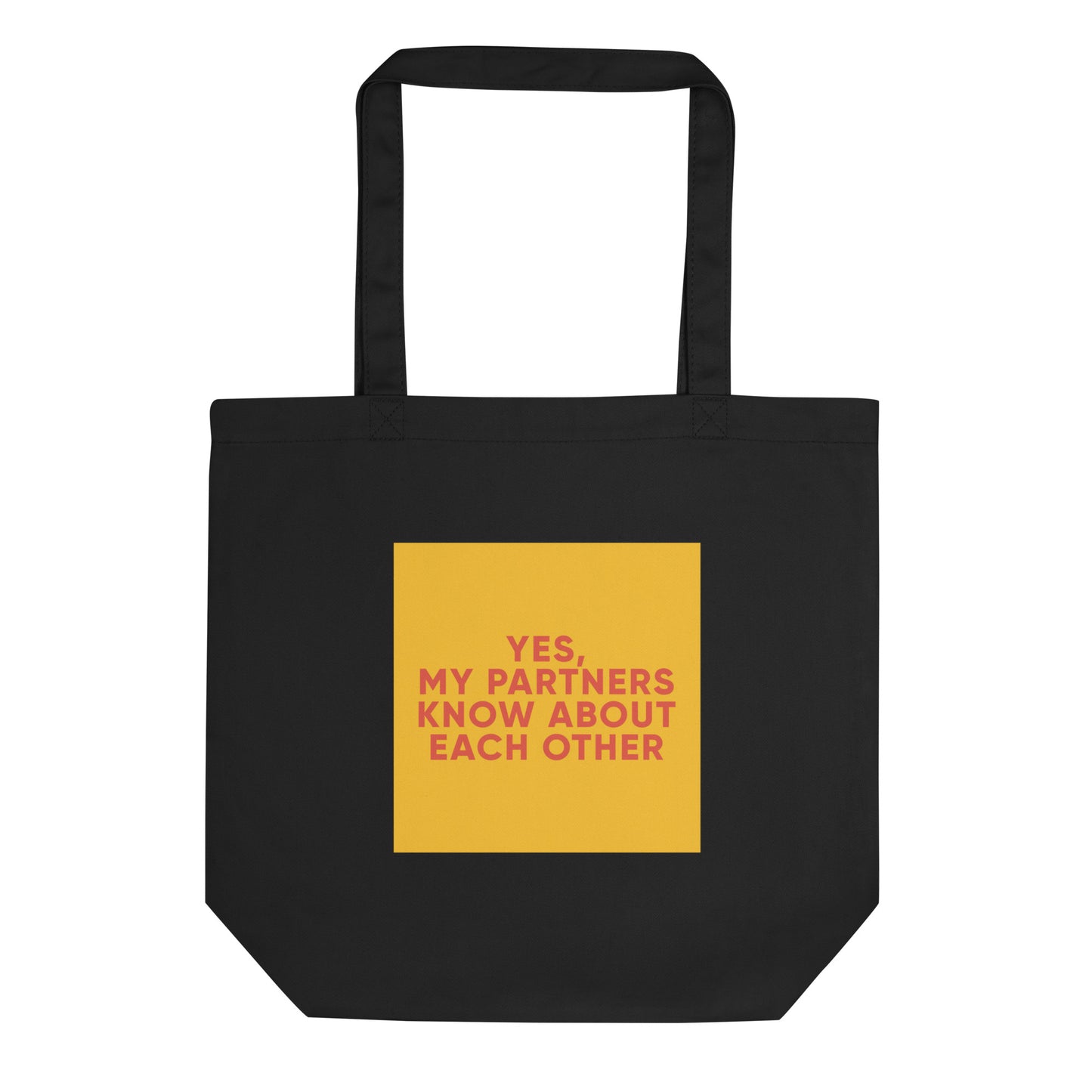 Black eco tote bag with a yellow-mustard square and bold orange-red text reading “YES, MY PARTNERS KNOW ABOUT EACH OTHER,” for ENM and polyam affirmation.