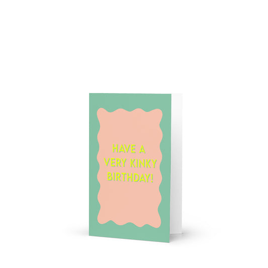 Pastel retro birthday card with a mint border and peach wavy frame featuring bold yellow text “Have a Very K!nky Birthday” for cheeky pleasure-positive greeting.