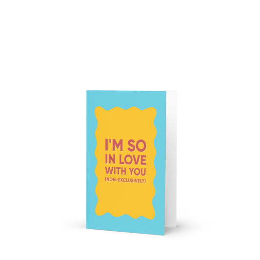 Bold blue, yellow and red polyamory greeting card with bold text reading “I’m So In Love With You (Non-Exclusively), celebrating ENM and non-monogamous love.