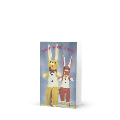 Vintage greeting card featuring two handmade toy bunnies with the text “You’re My Kind of Weird” for offbeat connections and affectionate humor.