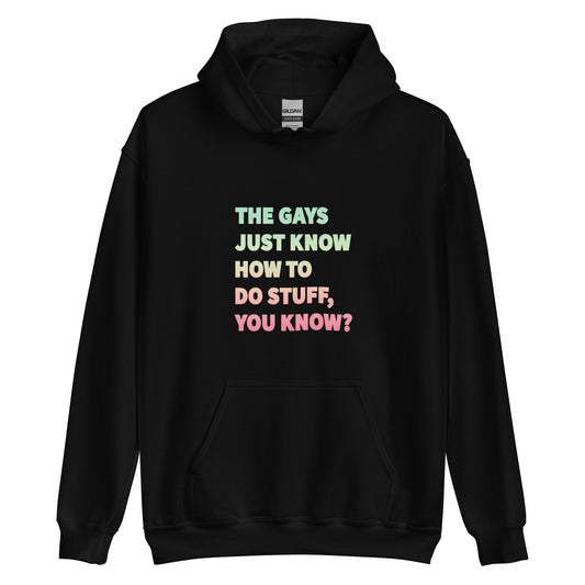 Pastel rainbow unisex hoodie with bold text reading “The Gays Just Know,” inspired by The White Lotus, for colorful queer statement wear.