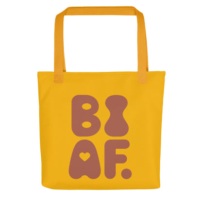 Mustard tote bag with terracotta “BI AF” text – bold lgbtq-affirming carryall for Bisexual visibility and joyful vibes