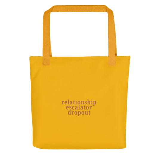 Mustard tote bag with terracotta text “Relationship Escalator Dropout” ENM accessory for non-monogamy pride everyday.