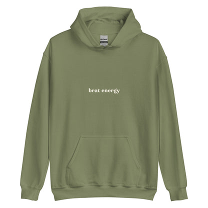 Unisex hoodie with bold cream text reading “Brat Energy” – cheeky statement sweatshirt for play-friendly expression with sass.