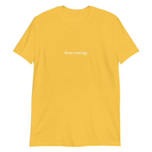 Unisex t-shirt with bold cream text reading “Brat Energy” – play-friendly statement tee for sassy dates or daily expression in style.