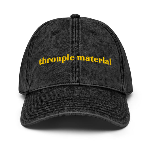 Black vintage inspired washed-out cap embroidered with “Throuple Material” – bold, stylish ENM statement hat