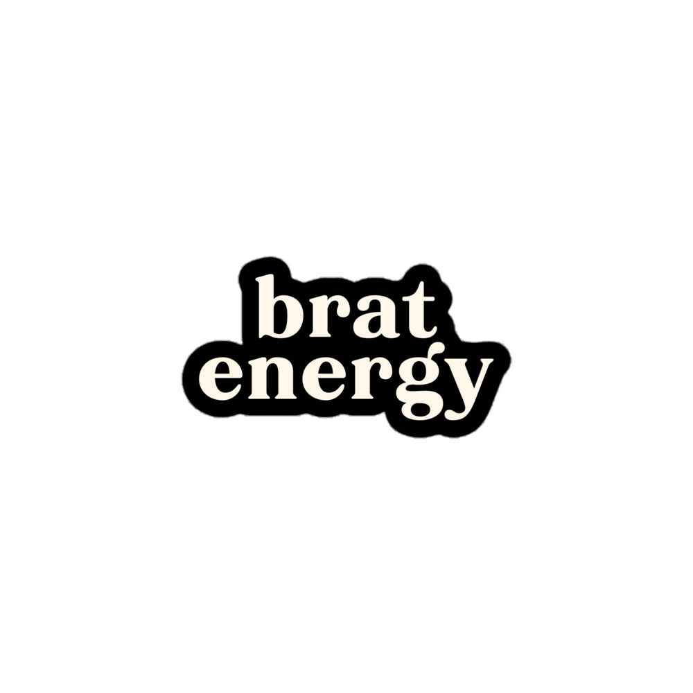 Vinyl sticker with cream text saying “Brat Energy” on black for playful personalities and cheeky statement style.