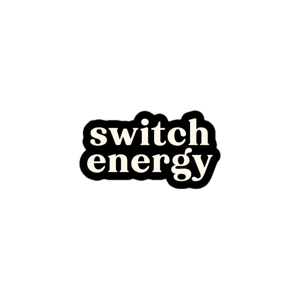 Vinyl sticker with cream text saying “Switch Energy” on black background for pleasure-friendly expression and flexibility pride.