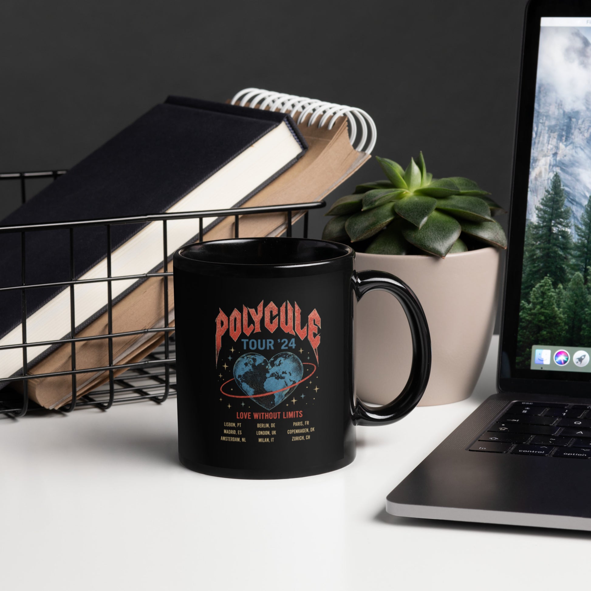 Black ceramic mug featuring vintage Polycule Tour concert graphic with heart globe illustration celebrating polyamory, ENM, metamours and love without limits.