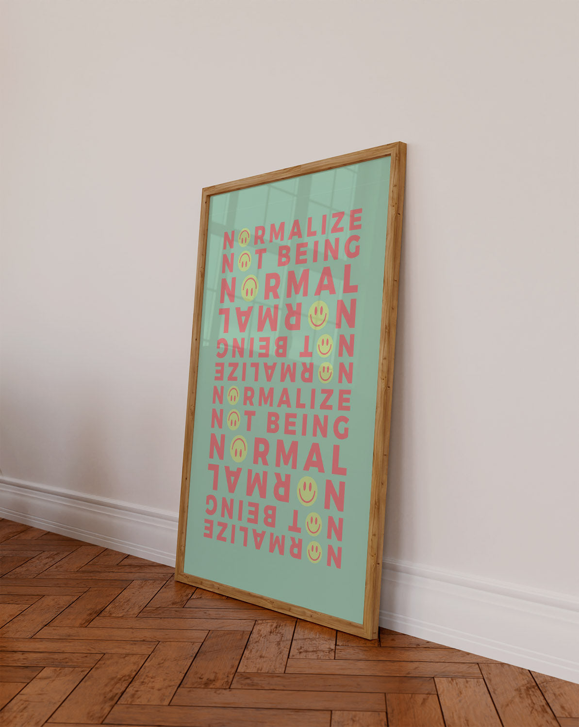 Modern Neurodivergent Poster with green tones leaning on against a white wall on a wooden floor