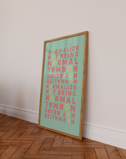 Modern Neurodivergent Poster with green tones leaning on against a white wall on a wooden floor